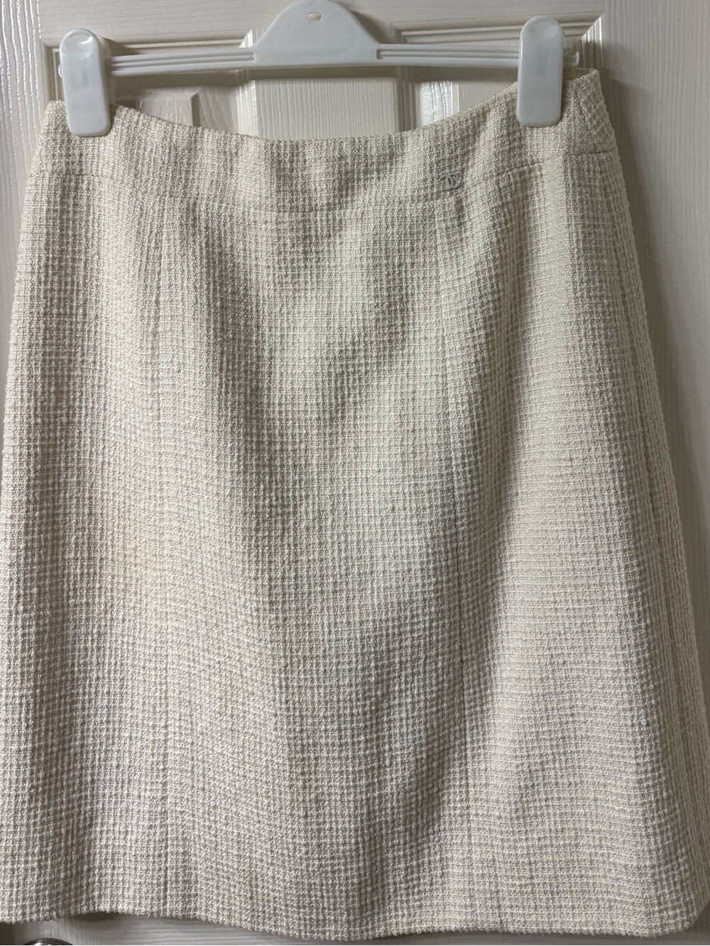 NWT CHANEL BOUCLE CREAM MIDI SKIRT w Chanel medal logo in front of. Sz 44 10-12